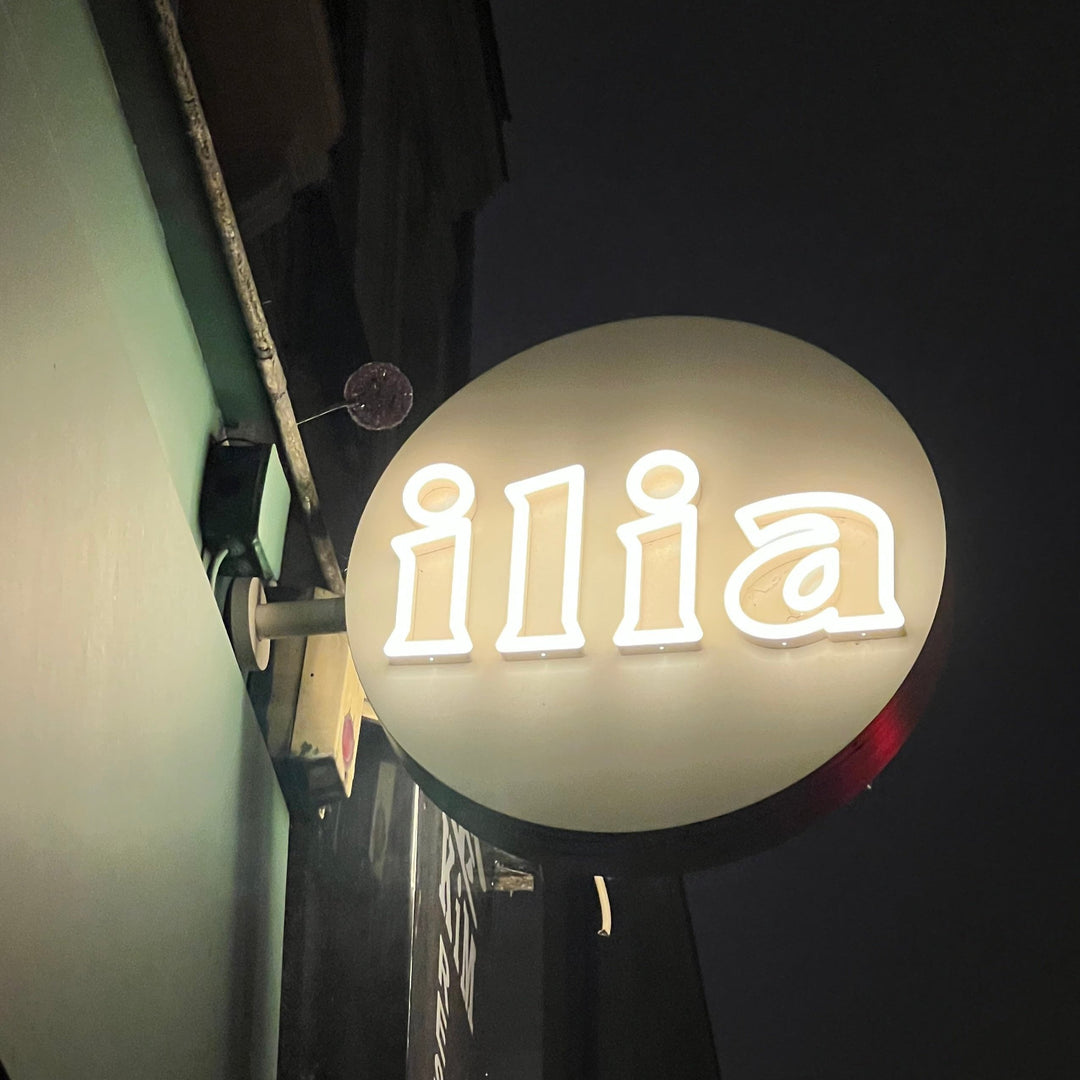 Ilia restaurant outdoor double-sided round lightbox with LED neon tube